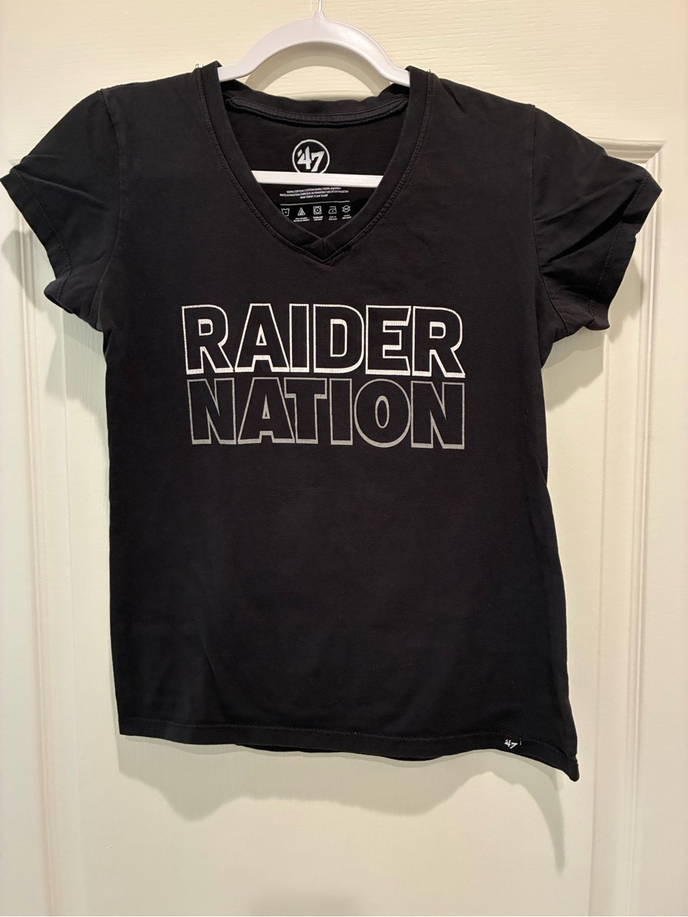 47 Black Raider Nation V-Neck Tee with White Outline Print